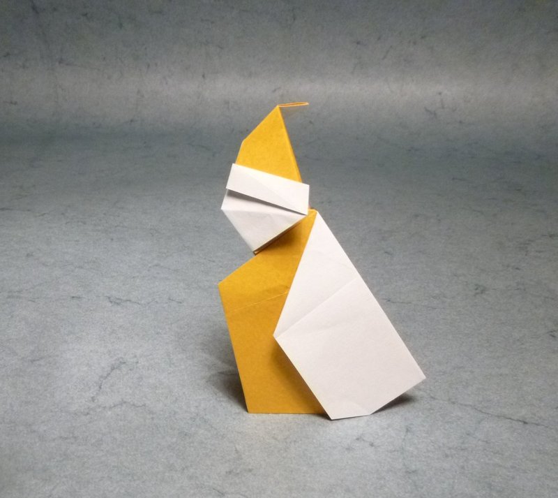 Santa claus.
De Mineo Shotaro.
Kami de 15 x 15 cm.
Diagramme dans le Tanteidan Convention Book 20.
