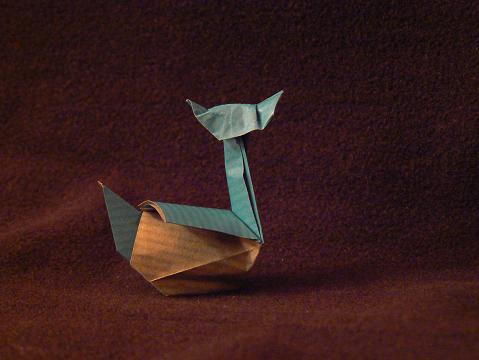 Canard 3d de Nicolas Terry
plié dans un kraft de 10*10 cm
Un plaisir à  plier !! :D
