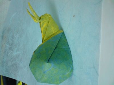 Escargot de Nicolas Terry
Plié dans un contrecollé au MC de murier bleu/jaune de 21*21 cm.
