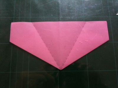 6
plier sur la médiane de chaque côté / fold to the center on the both sides
