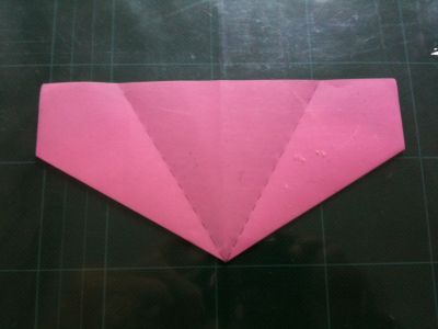 6
plier sur la médiane de chaque côté / fold to the center on the both sides
