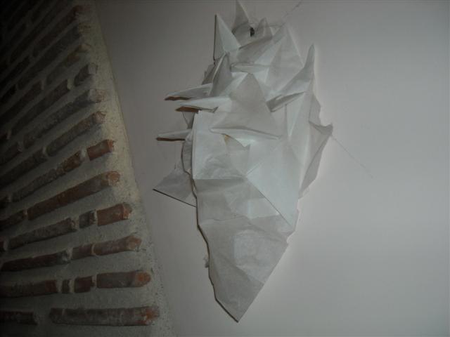 variante de l'homme vert
Je ne me rappelle plus de l'auteur. Plié dans un papier de soie de 1m sur 1m pour servir d'applique
