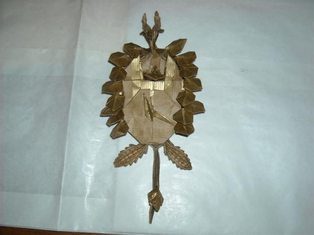 Coucou de la Forêt noire de Robert LANG
Papier Kraft 70 g, bicolore (un coté neutre, un coté bronze)
