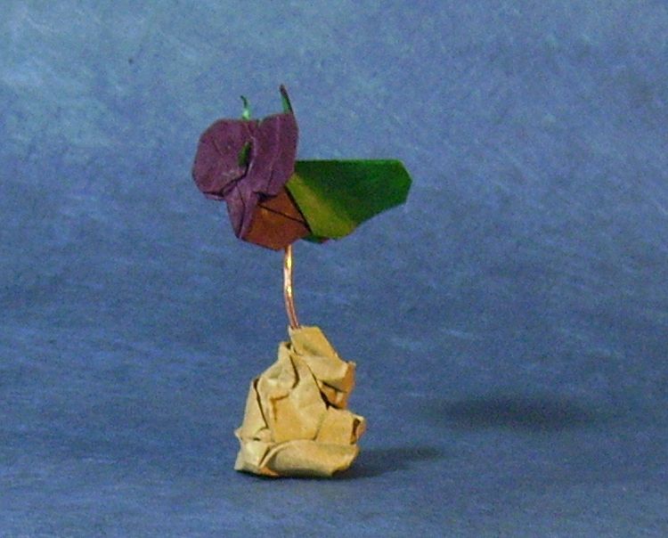 Mouche cartoon
Ma deuxième création, pour le challenge de janvier 2011 - la base du placard.
double soie vert-marron de 9cm
CP dans ma galerie
Mots-clés: mouche