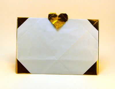 Cadre Photo
Cadre photo de Miyajima Noboru
Papier : Papier origami doré 30x30
Taille du cadre photo : 14,5x10
