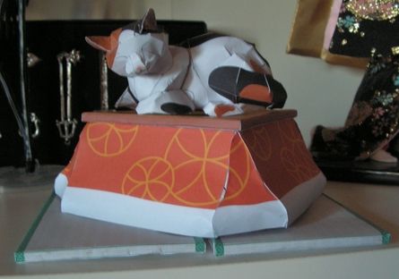 chat sur son kotatsu 2
