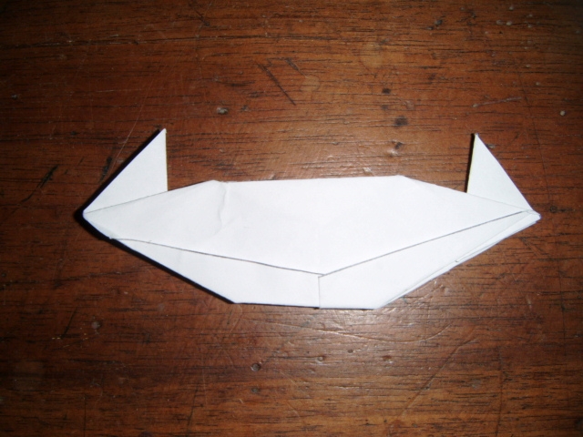 plié dans un carré de 10x10cm de papier d'imprimante.
