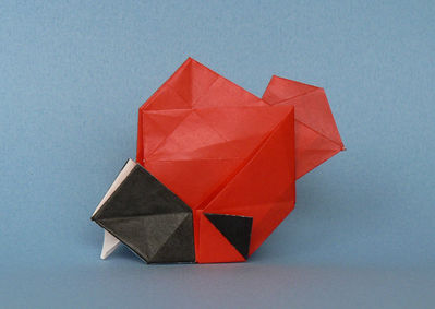 Poisson de Hsi-hua Liu
Un petit modèle en box-pleating, très décoratif, qui gagne en charme quand on utilise des couleurs contrastées. Ici, kami rouge/blanc de 15x15cm, avec coloration noire au feutre. C'était le challenge de pliage d'avril 2009. J'aime les poissons d'avril =)
Mots-clés: poisson fish Hsi-Lua