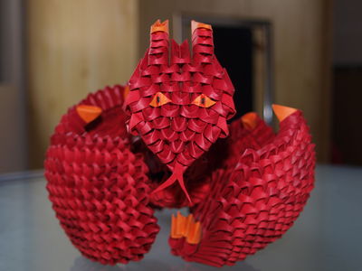 dragon 3D
trouvé sur yout... (par Girnelis, je sais pas son vrai nom), j'ai changé les couleurs, je préfère le rouge au bleu. Mais le montage est celui présenté sur yout...
